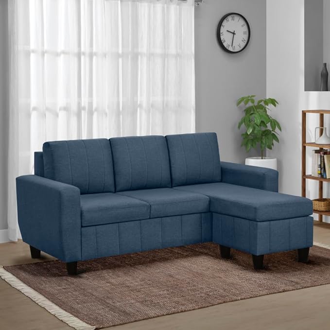 Bold blue sofa in living room with carpet