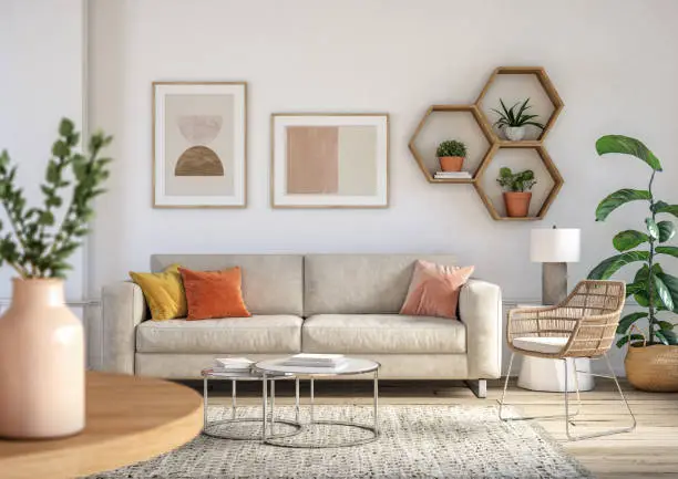 A living room featuring a are rug, sofa, pillows and wall gallery